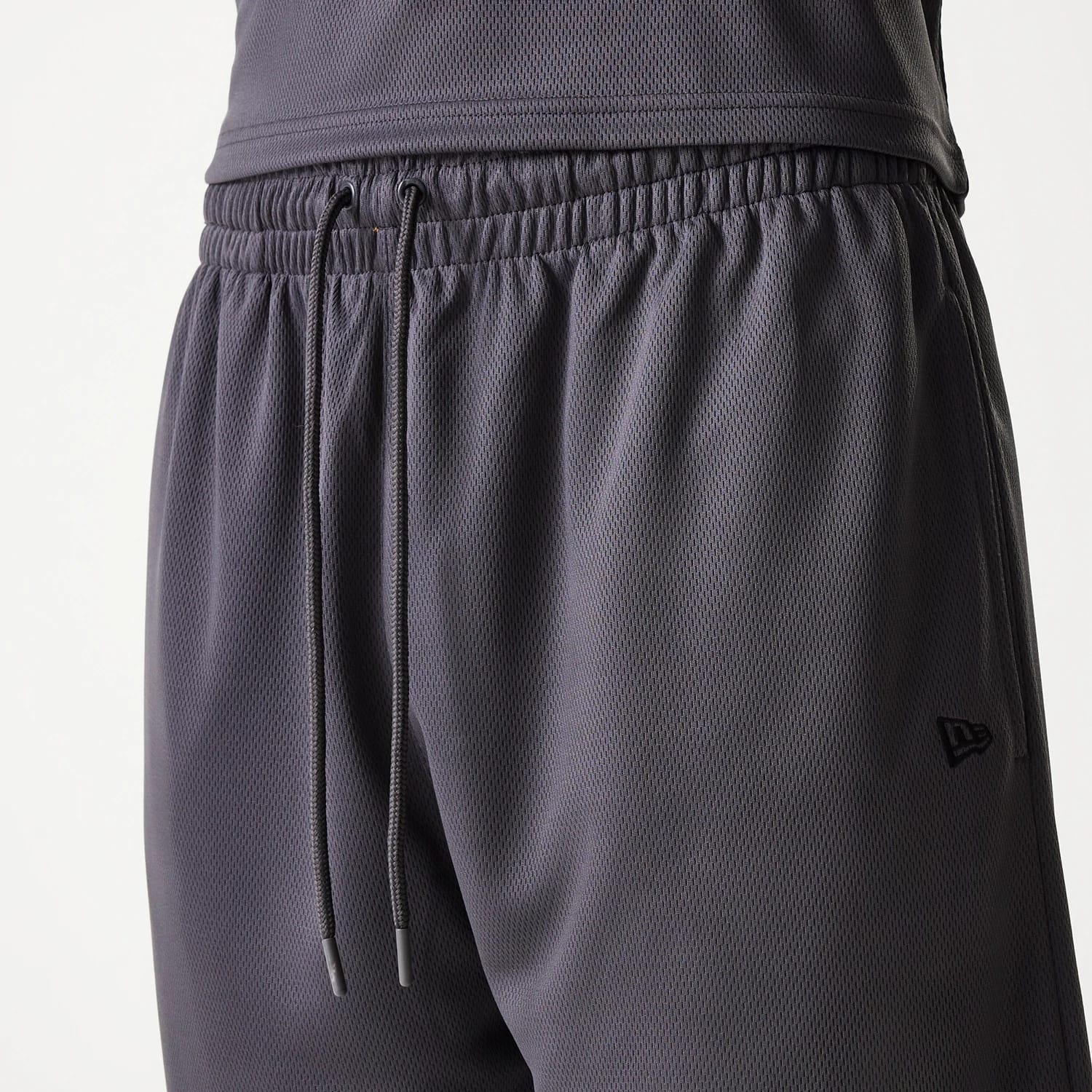 The Male model is wearing Chicago Bulls NBA Tonal Dark Grey Mesh Shorts 6
