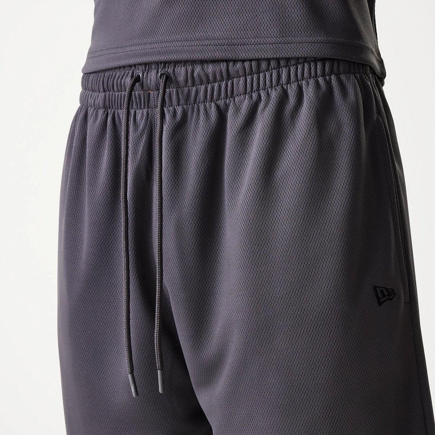 The Male model is wearing Chicago Bulls NBA Tonal Dark Grey Mesh Shorts 6