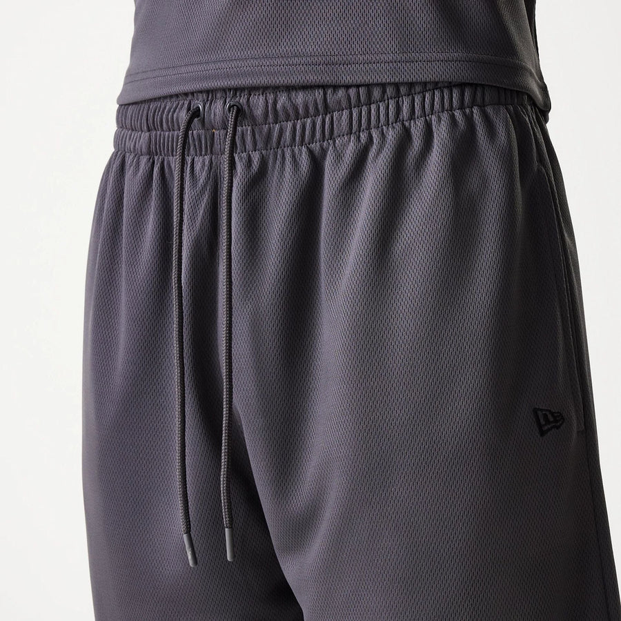 The Male model is wearing Chicago Bulls NBA Tonal Dark Grey Mesh Shorts 6