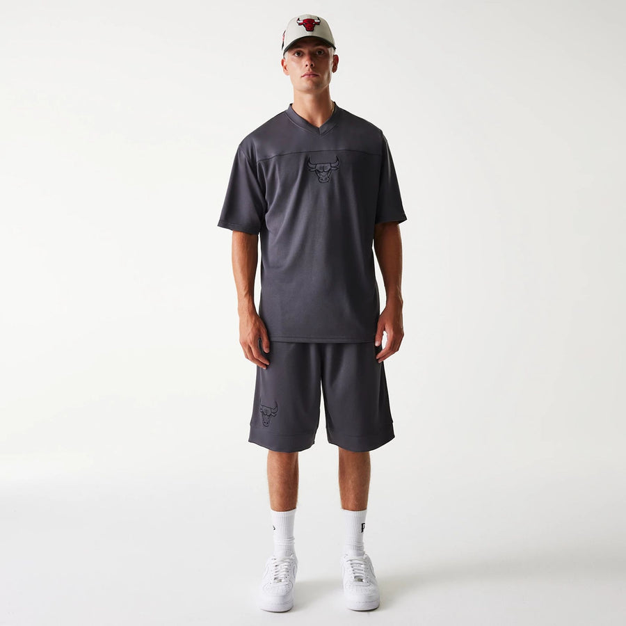 The Male model is wearing Chicago Bulls NBA Tonal Dark Grey Mesh Shorts 8