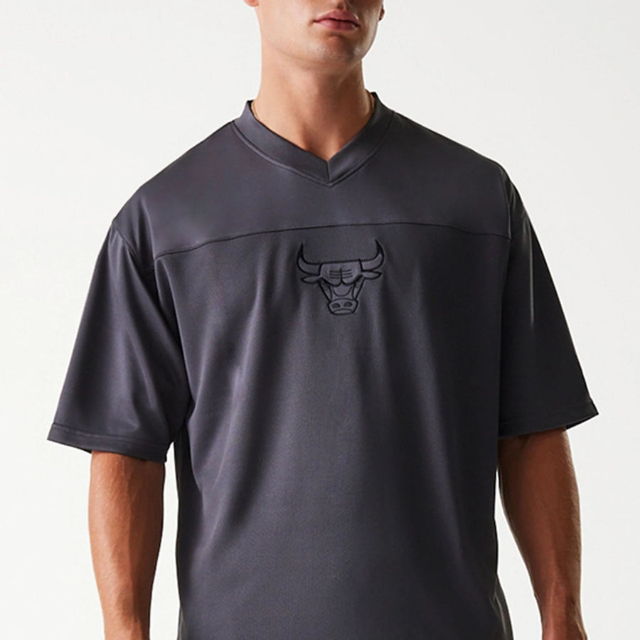 The Male model is wearing Chicago Bulls NBA Tonal Dark Grey Mesh Jersey 3