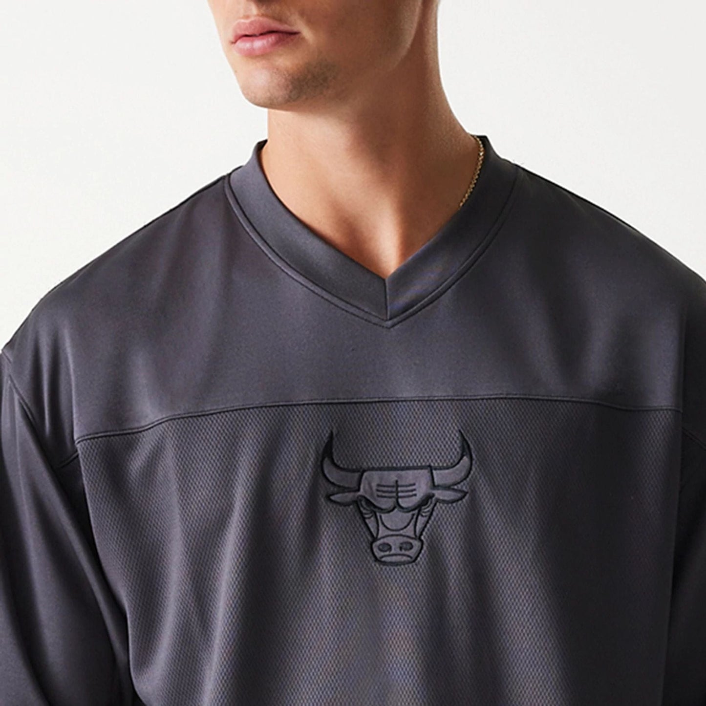 The Male model is wearing Chicago Bulls NBA Tonal Dark Grey Mesh Jersey 5