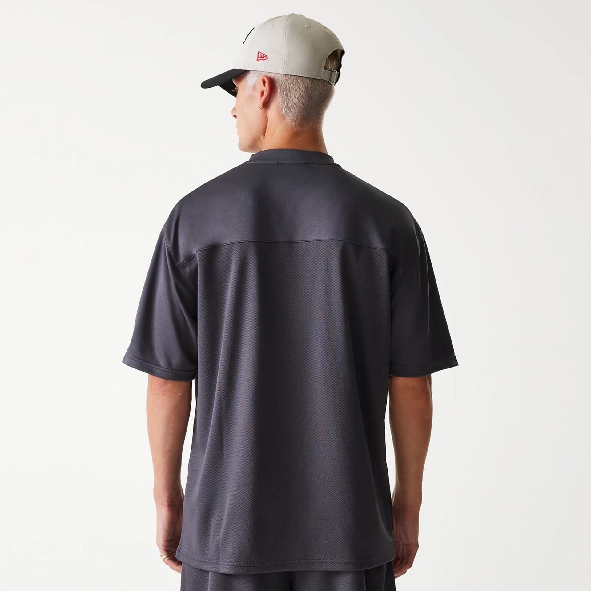 The Male model is wearing Chicago Bulls NBA Tonal Dark Grey Mesh Jersey 2