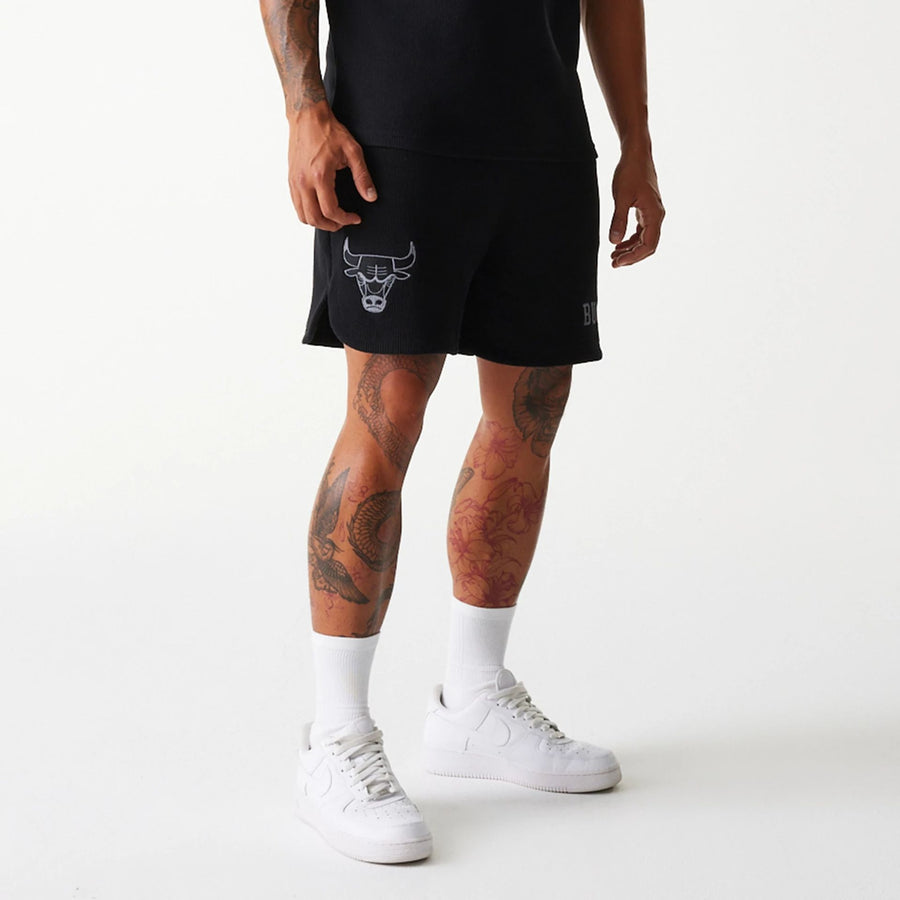 The Male model is wearing Chicago Bulls NBA Waffle Black Shorts 7