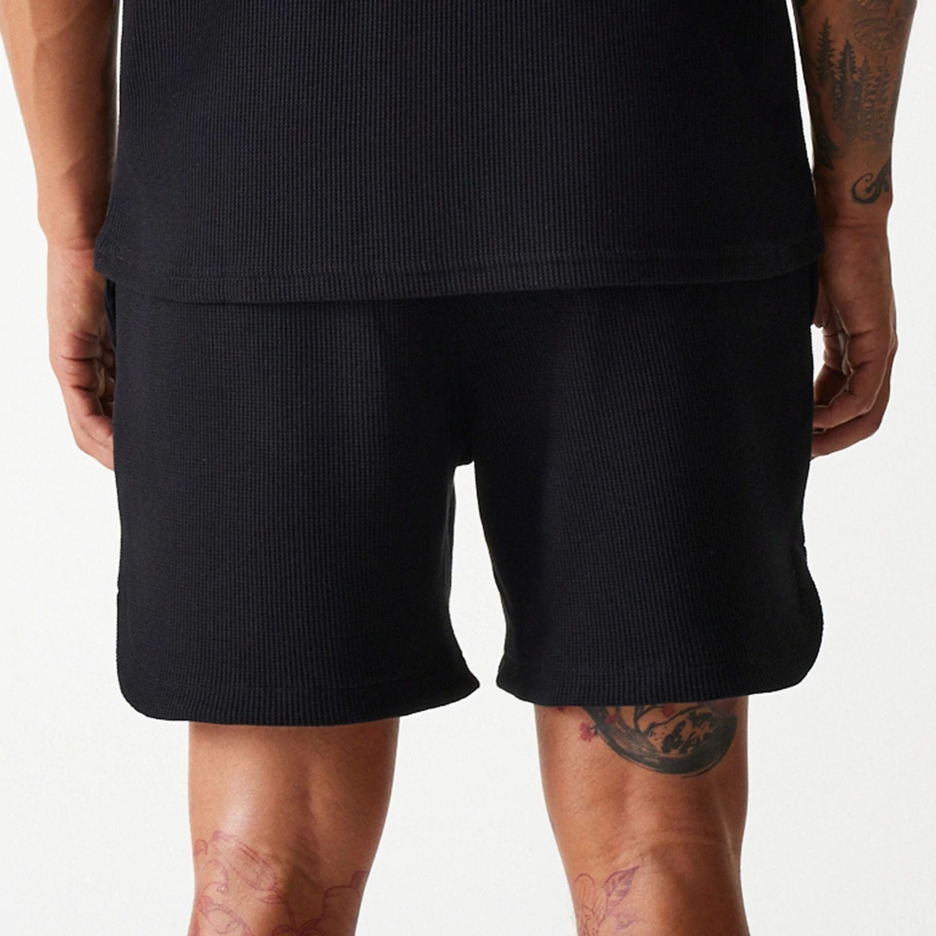The Male model is wearing Chicago Bulls NBA Waffle Black Shorts 6
