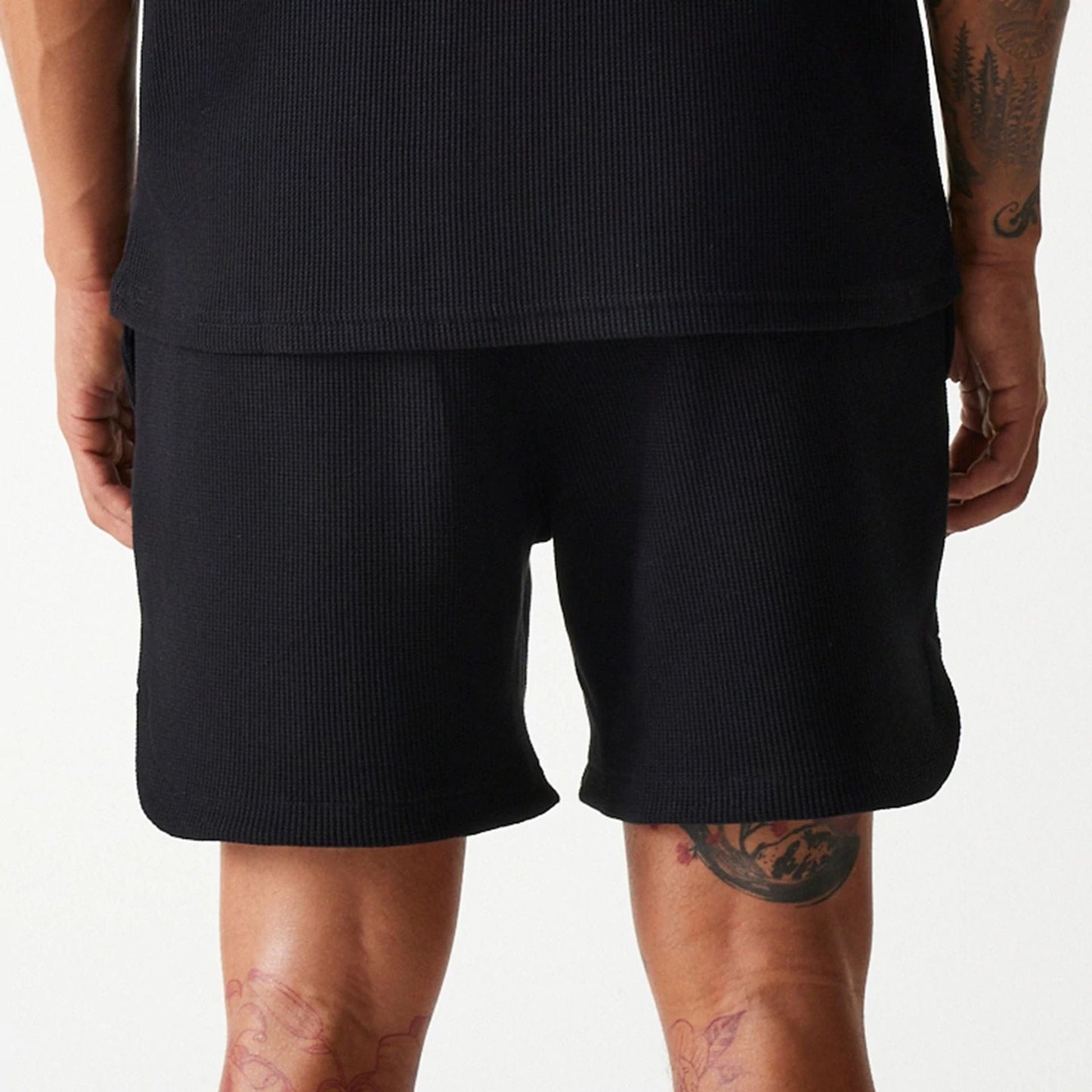 The Male model is wearing Chicago Bulls NBA Waffle Black Shorts 6