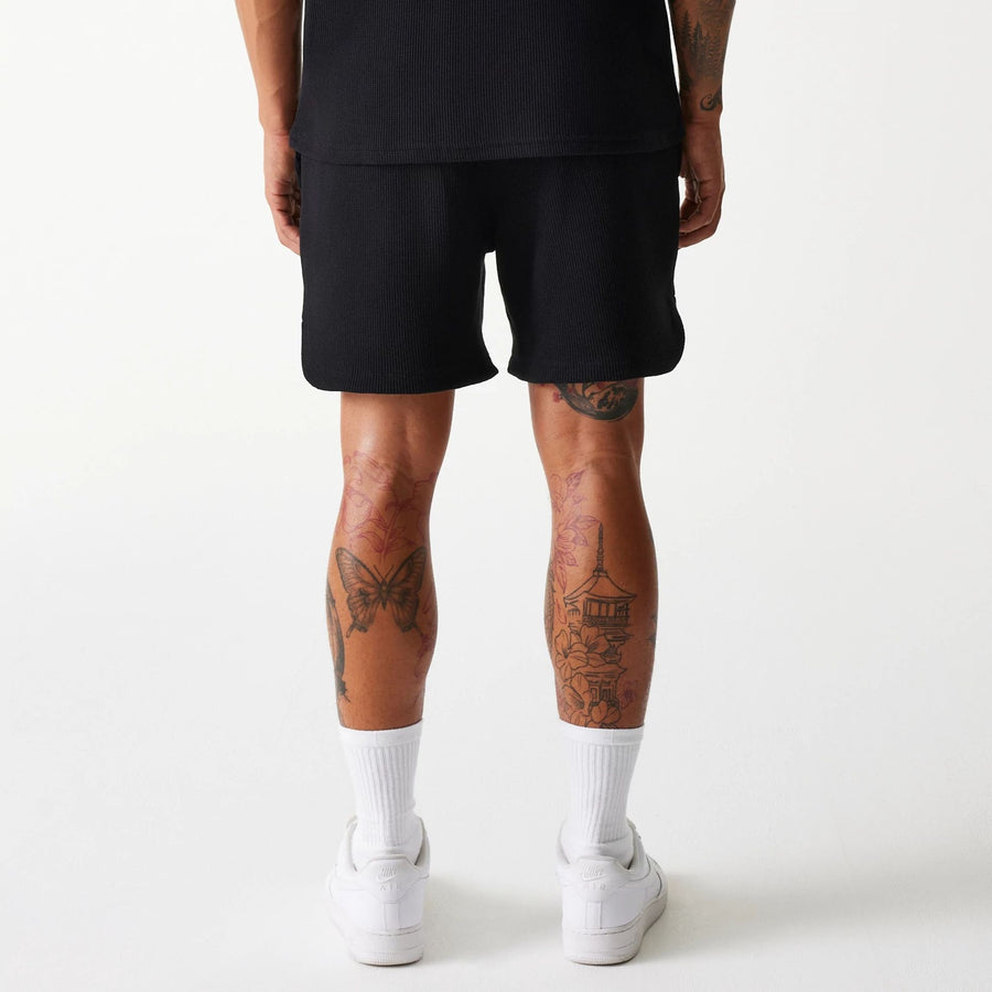 The Male model is wearing Chicago Bulls NBA Waffle Black Shorts 2