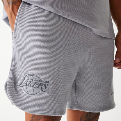 The Male model is wearing LA Lakers NBA Waffle Grey Shorts 3