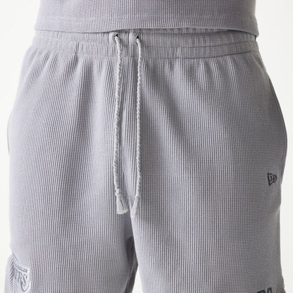 The Male model is wearing LA Lakers NBA Waffle Grey Shorts 5
