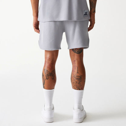 The Male model is wearing LA Lakers NBA Waffle Grey Shorts 2