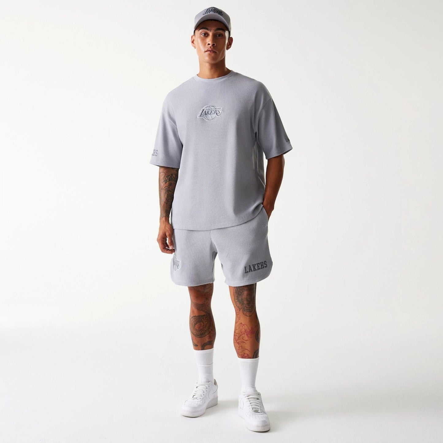 The Male model is wearing LA Lakers NBA Waffle Grey Shorts 8