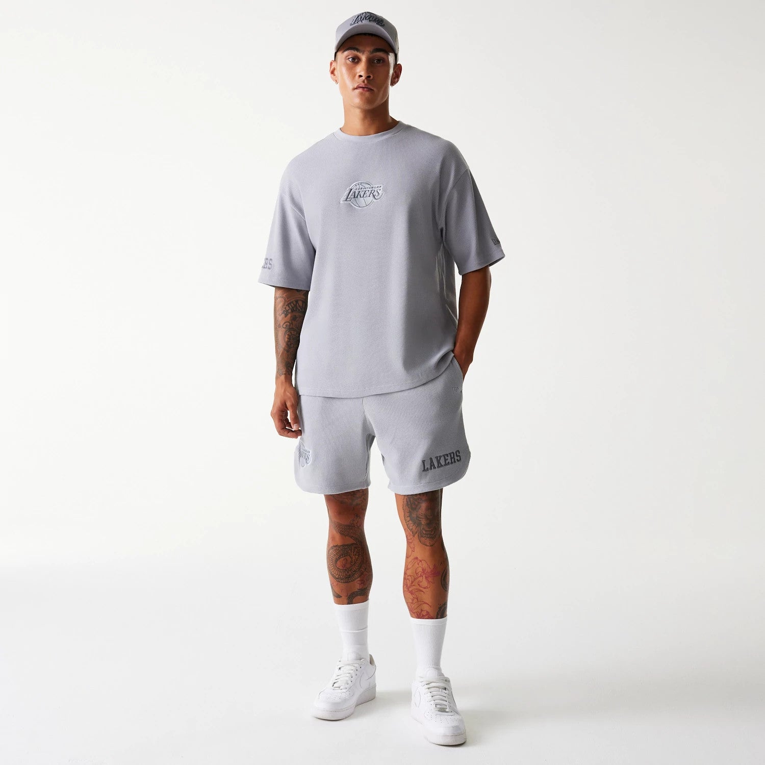 The Male model is wearing LA Lakers NBA Waffle Grey Shorts 8