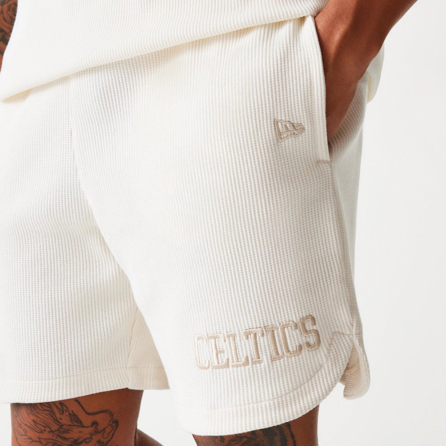 The Male model is wearing Boston Celtics NBA Waffle Open White Shorts 4
