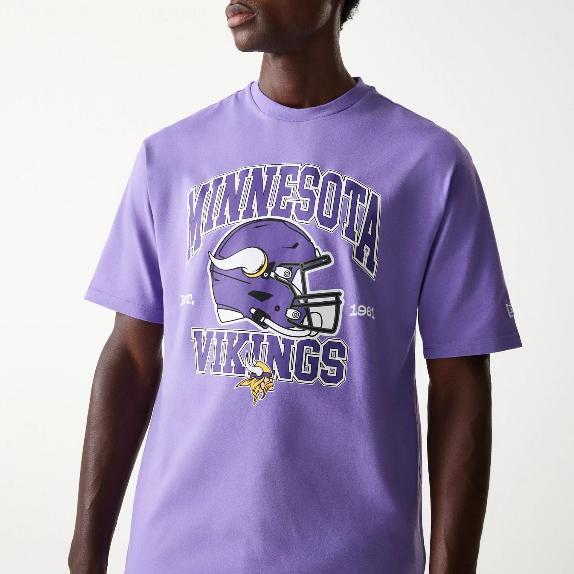 The Male model is wearing Minnesota Vikings NFL Helmet Purple Oversized T-Shirt 3