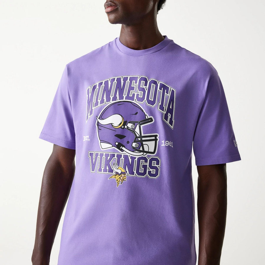 The Male model is wearing Minnesota Vikings NFL Helmet Purple Oversized T-Shirt 3