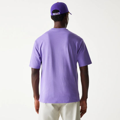 The Male model is wearing Minnesota Vikings NFL Helmet Purple Oversized T-Shirt 2