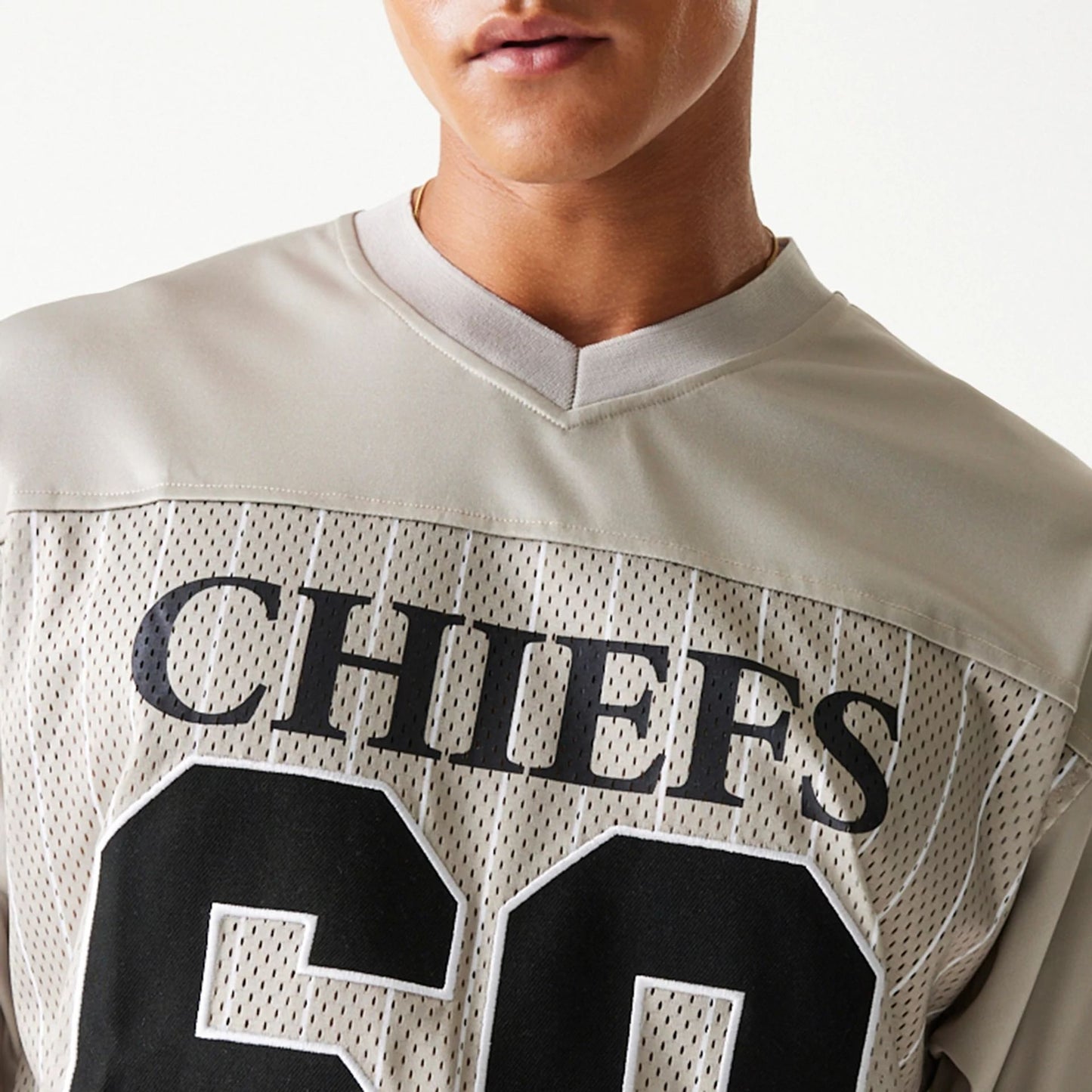 The Male model is wearing Kansas City Chiefs NFL Pinstripe Cream Mesh Jersey 7