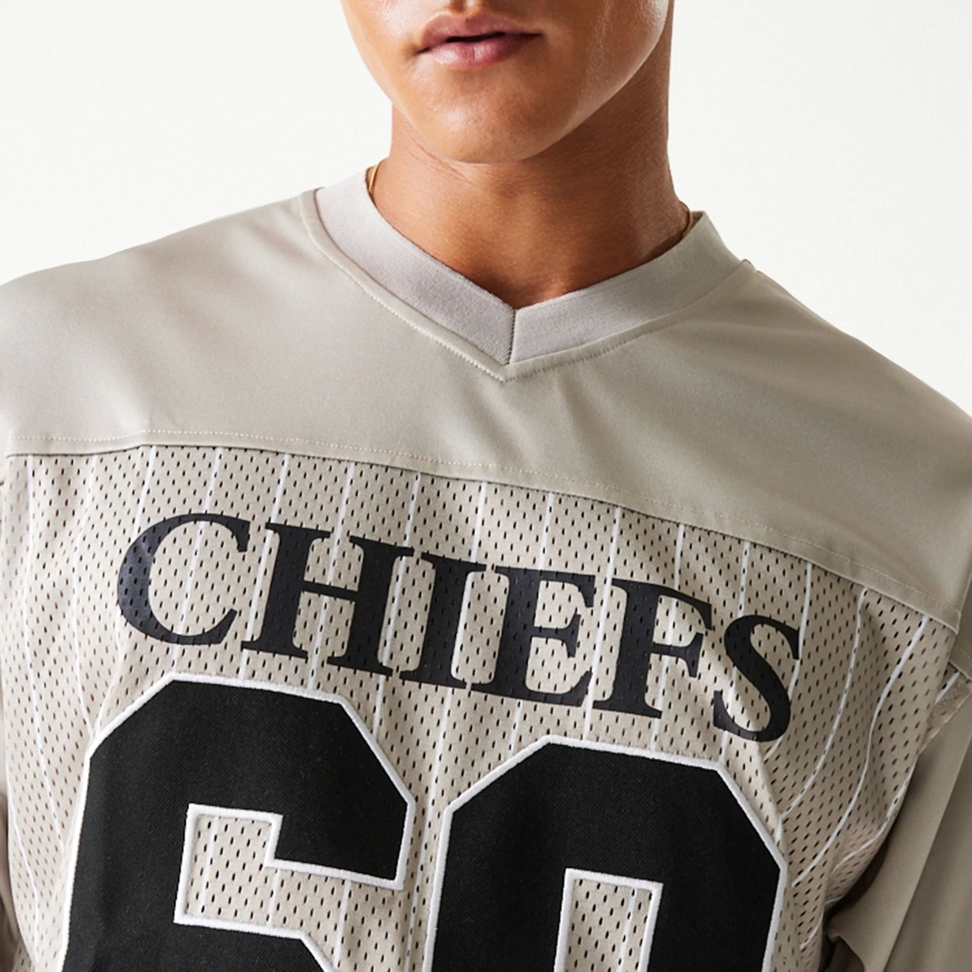 The Male model is wearing Kansas City Chiefs NFL Pinstripe Cream Mesh Jersey 7