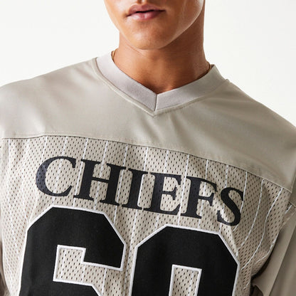 The Male model is wearing Kansas City Chiefs NFL Pinstripe Cream Mesh Jersey 7
