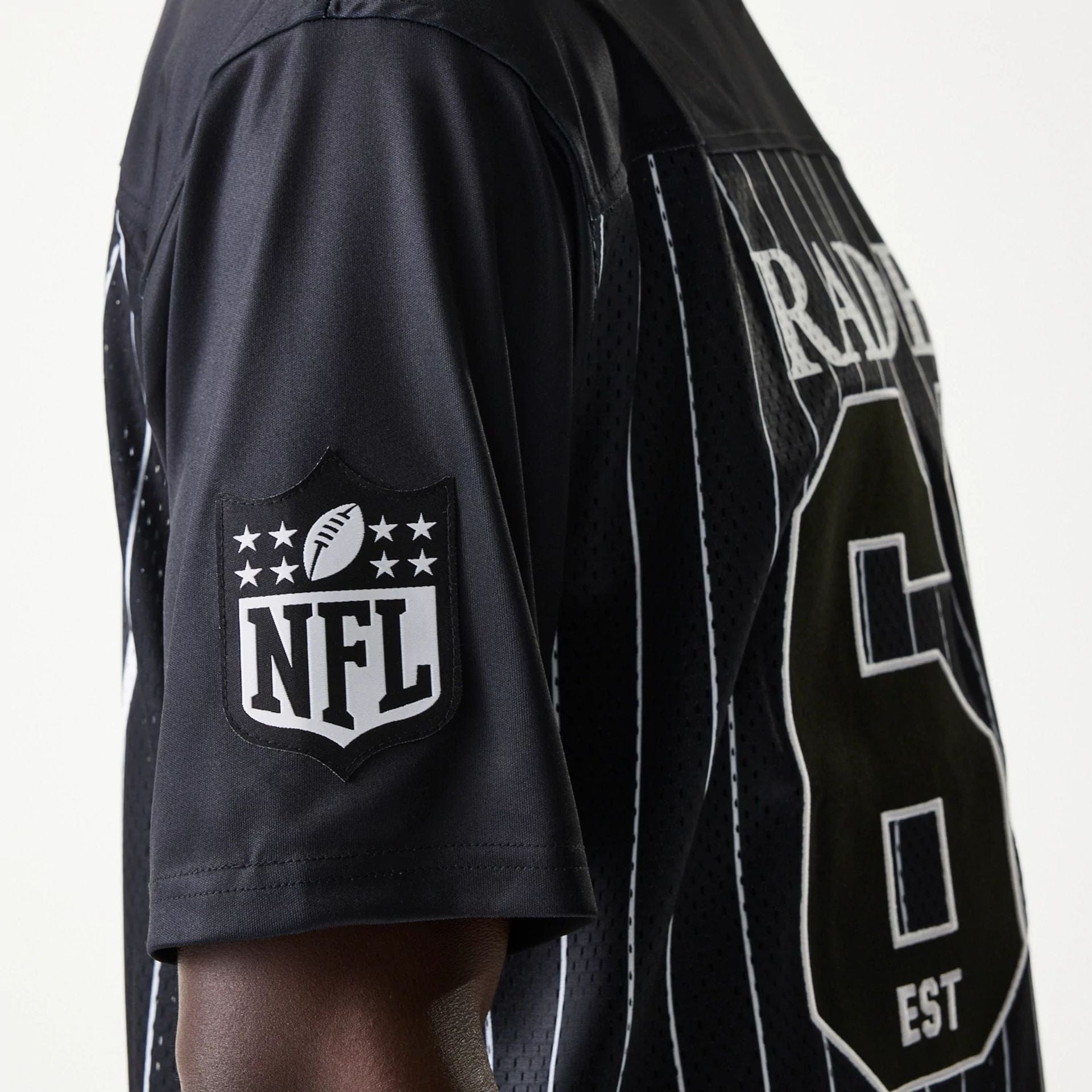 The Male model is wearing Las Vegas Raiders NFL Stripe Black Long Sleeve Jersey 7