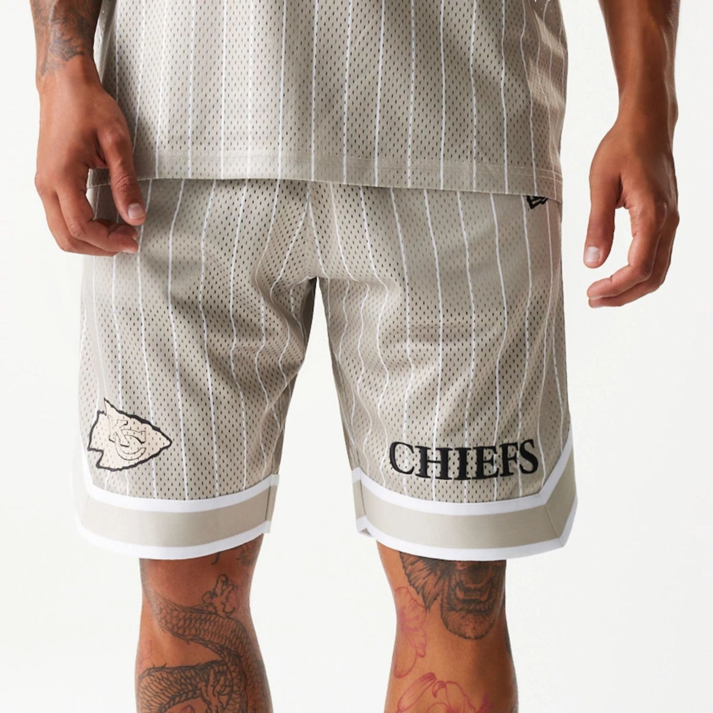 The Male model is wearing Kansas City Chiefs NFL Pinstripe Cream Shorts 3