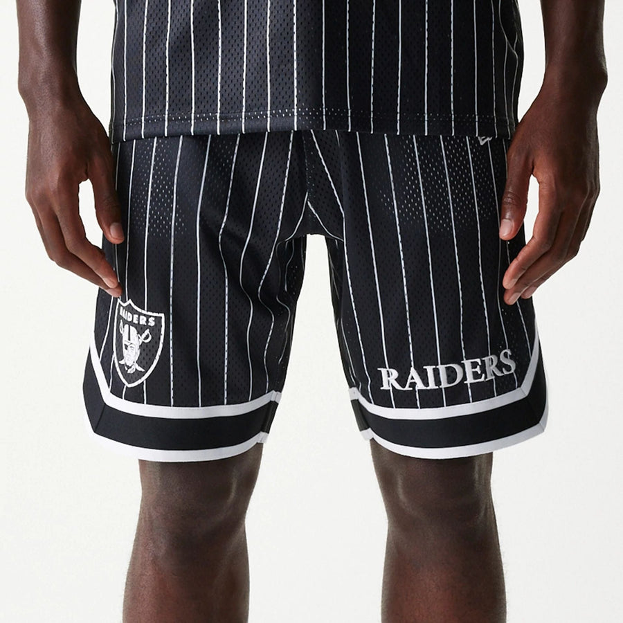 The Male model is wearing Las Vegas Raiders NFL Pinstripe Black Shorts 3