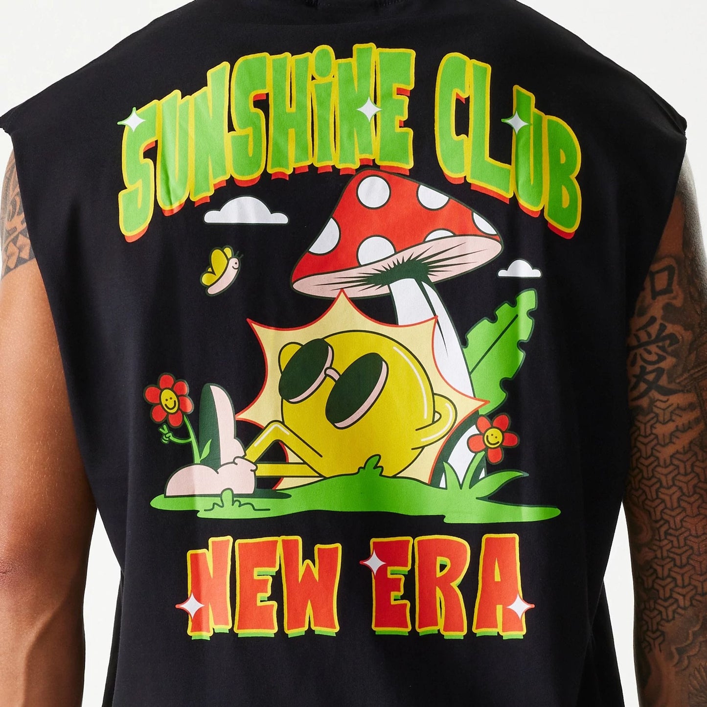 The Male model is wearing New Era Outdoor Graphic Black Sleeveless T-Shirt 4