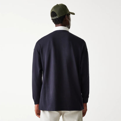 The Male model is wearing New Era Navy Oversized Rugby Shirt 2