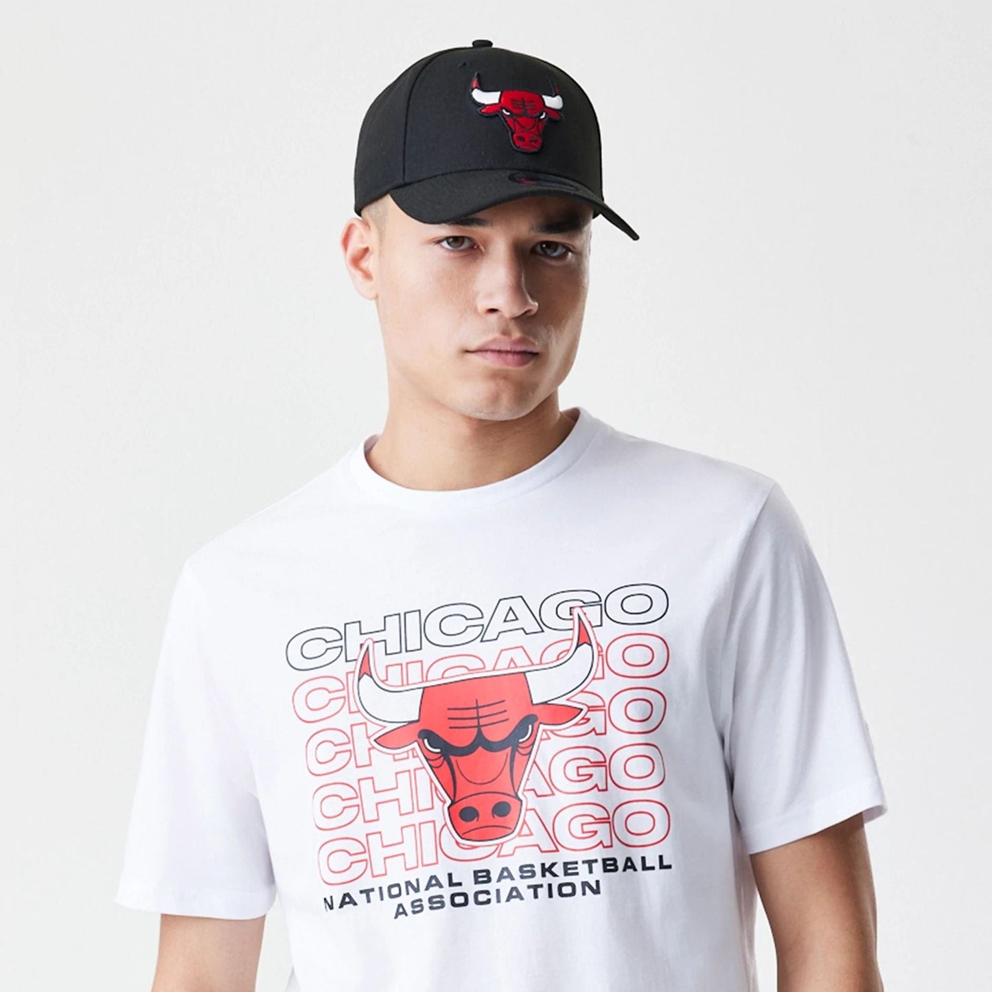 The Male model is wearing Chicago Bulls NBA Stack Wordmark White T-Shirt 6