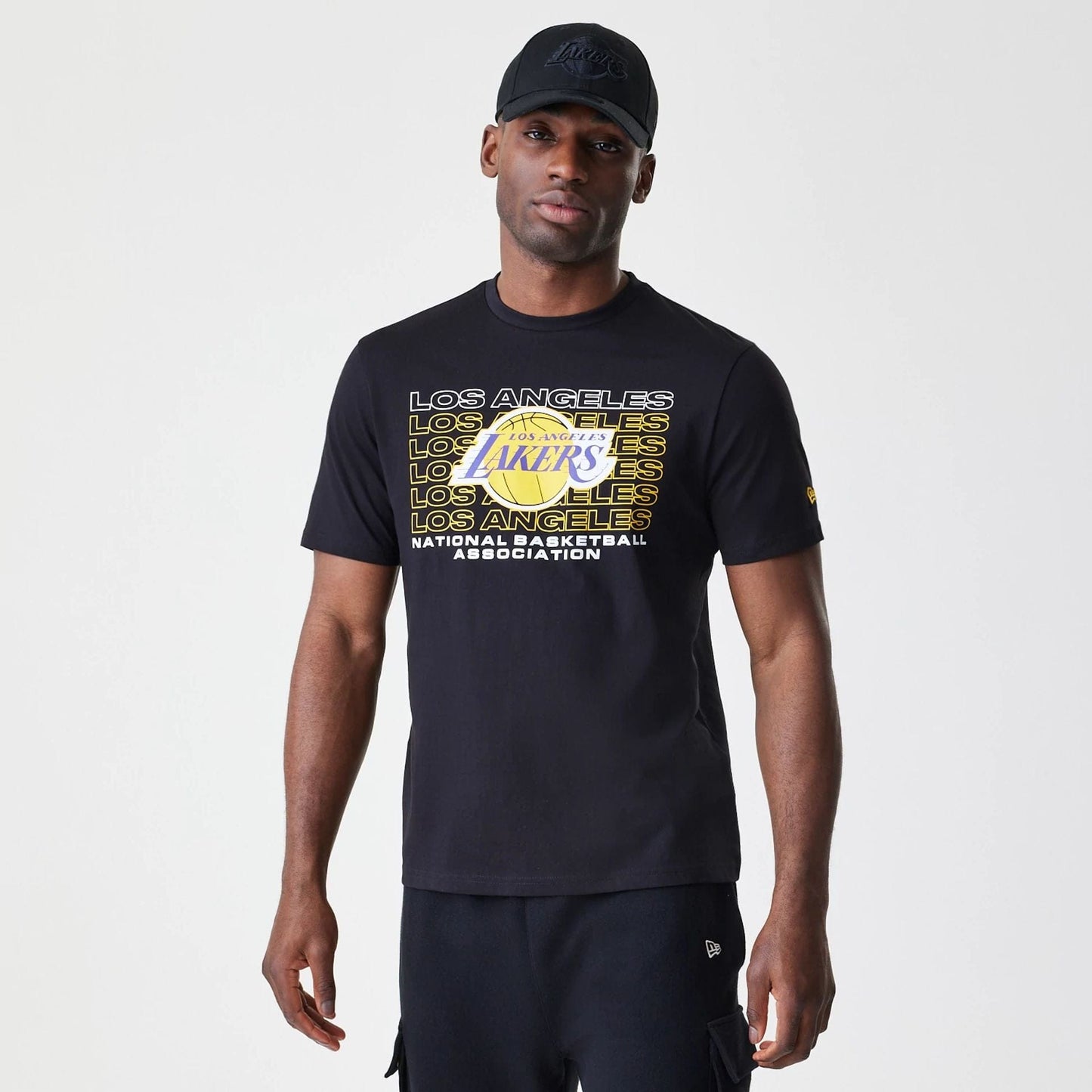 The Male model is wearing LA Lakers NBA Stack Wordmark Black T-Shirt 1