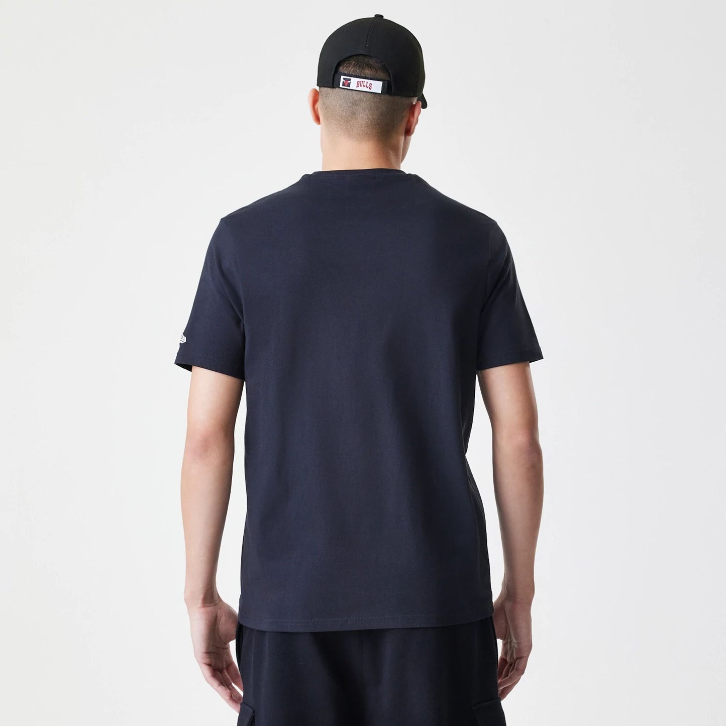 The Male model is wearing Chicago Bulls NBA Logo Black T-Shirt 2