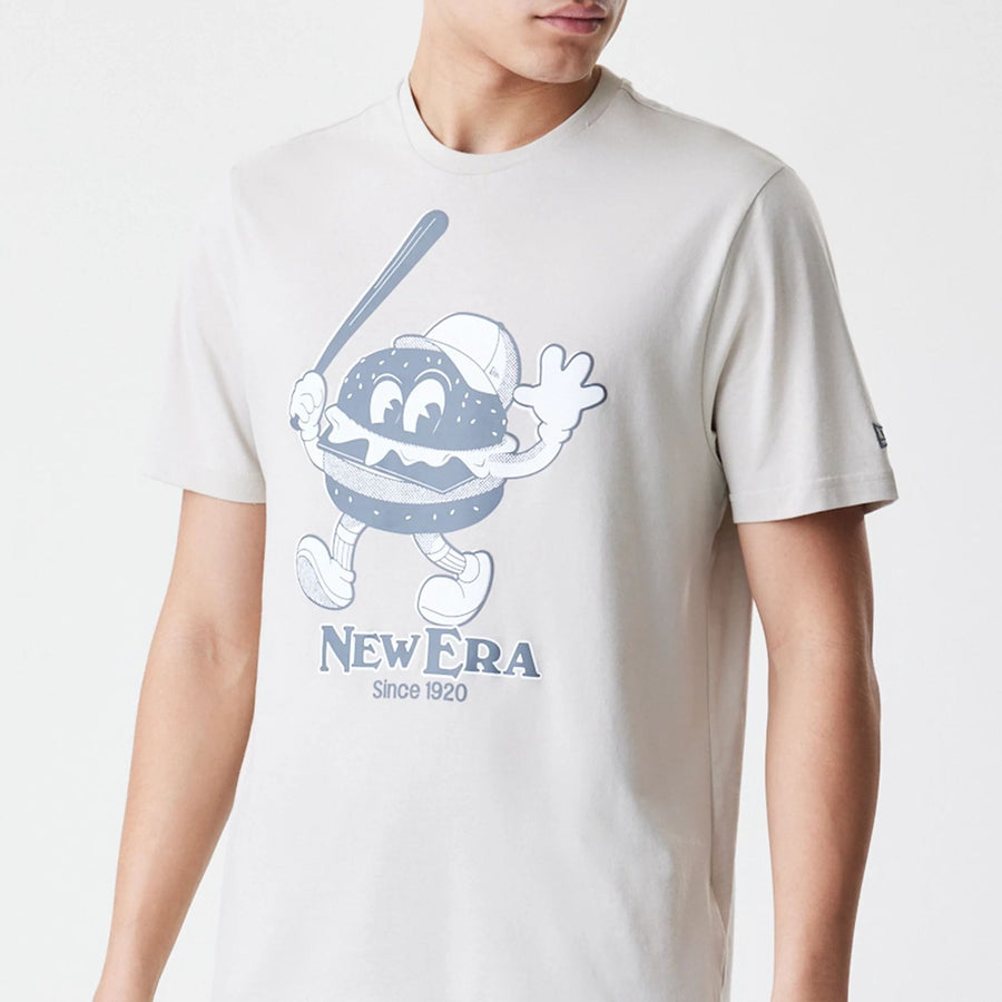The Male model is wearing New Era Burger Graphic Cream T-Shirt 4