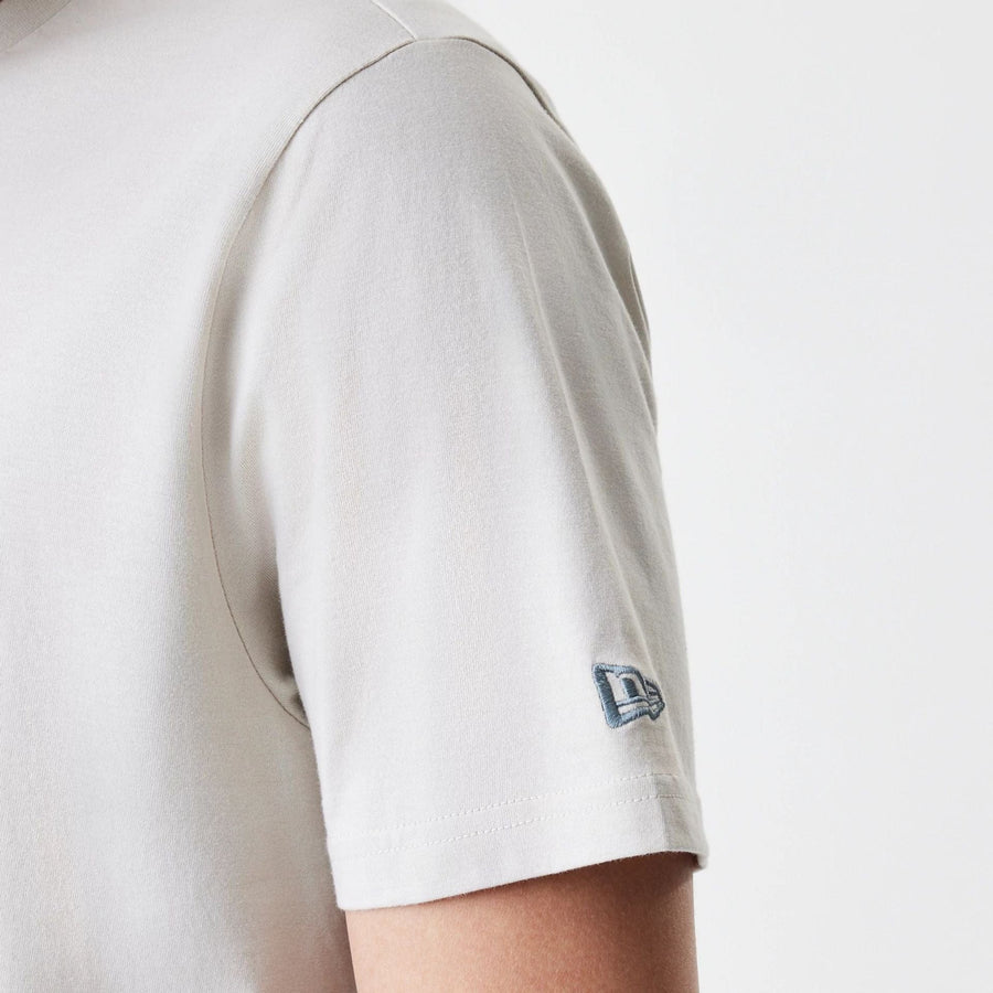 The Male model is wearing New Era Burger Graphic Cream T-Shirt 5