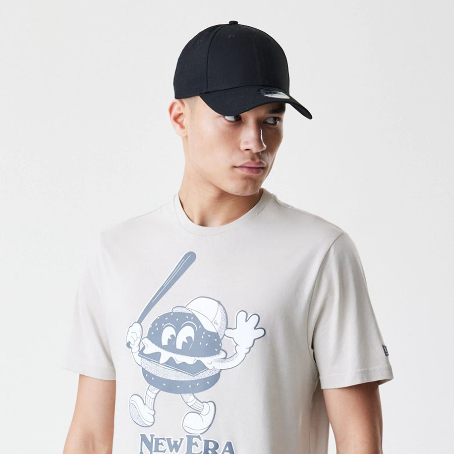 The Male model is wearing New Era Burger Graphic Cream T-Shirt 6