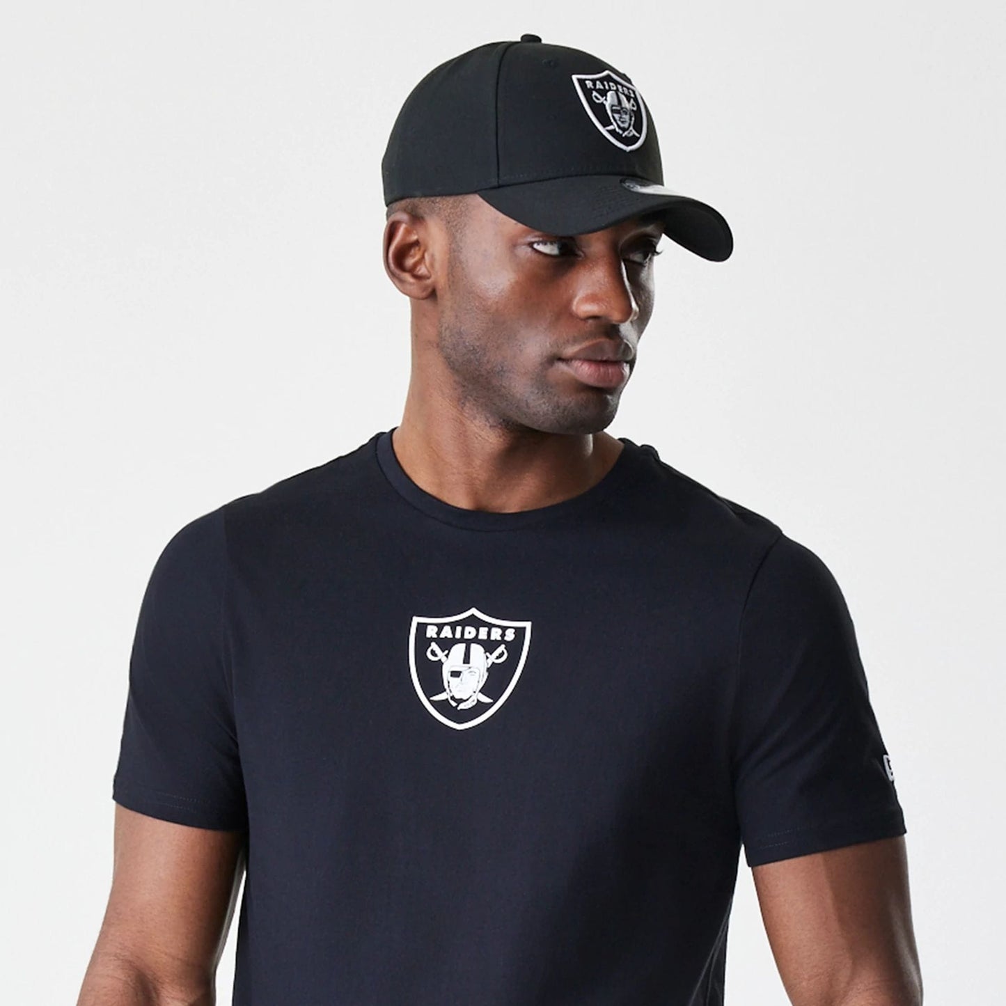 The Male model is wearing Las Vegas Raiders NFL Logo Black T-Shirt 6
