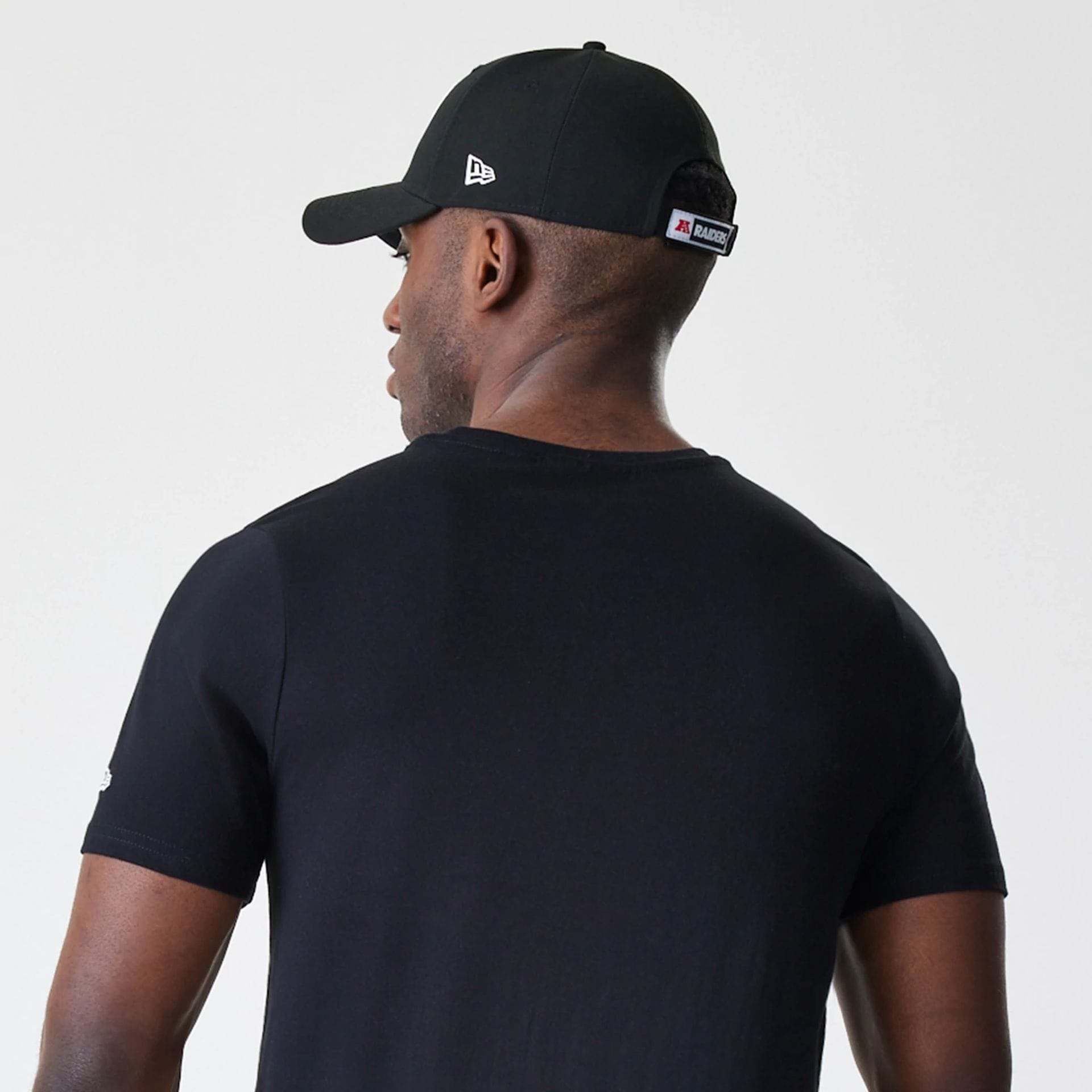 The Male model is wearing Las Vegas Raiders NFL Logo Black T-Shirt 7
