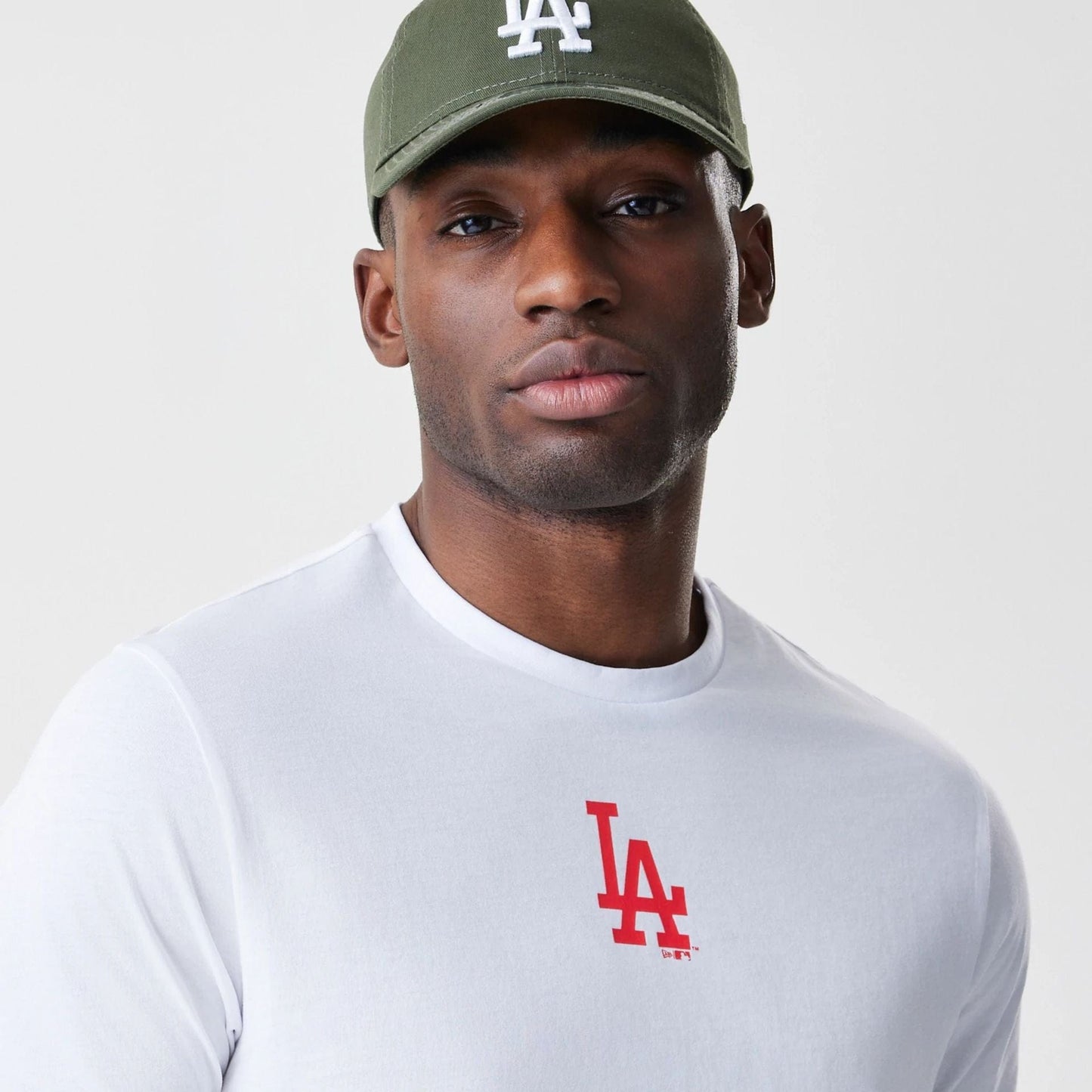 The Male model is wearing LA Dodgers MLB Logo White T-Shirt 4