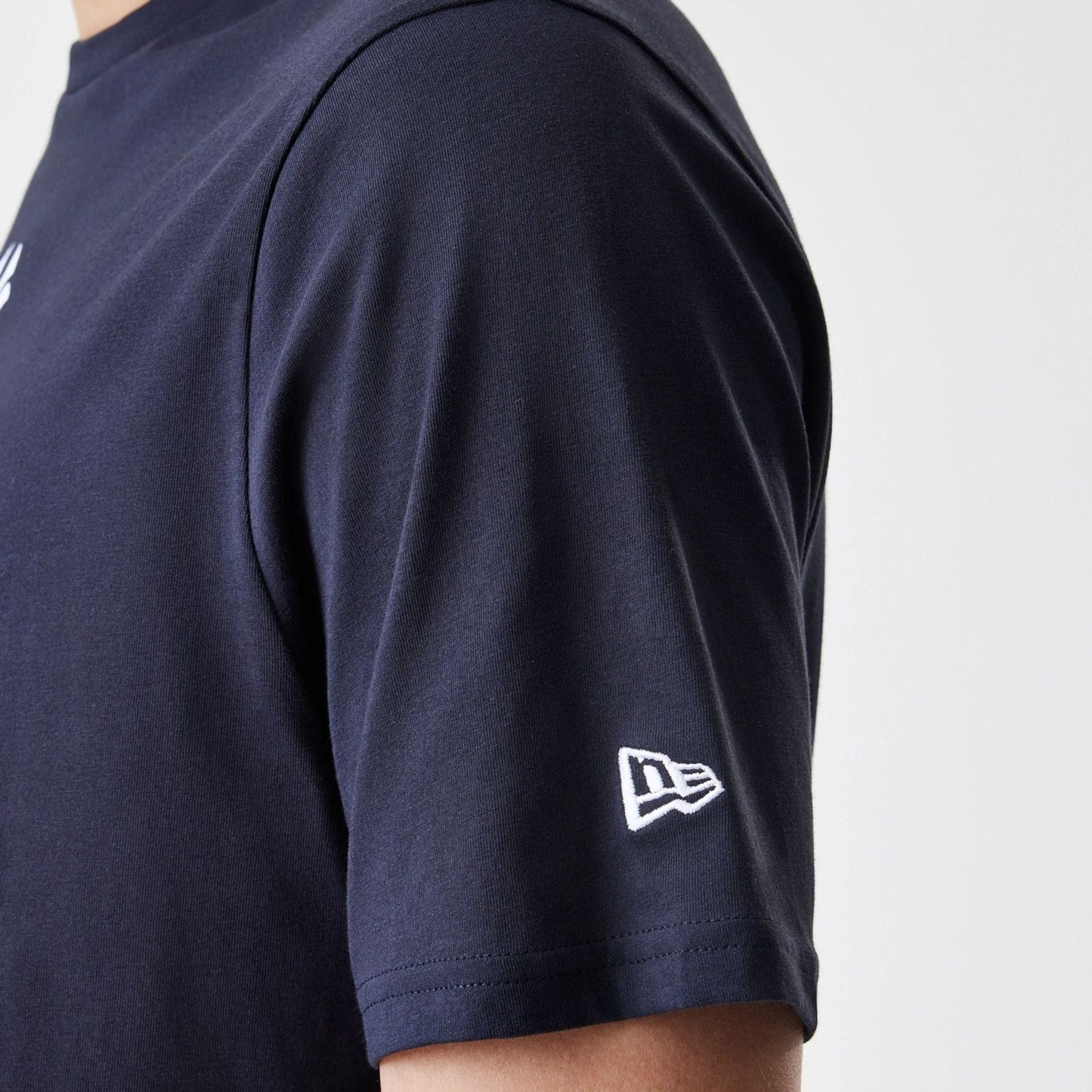 The Male model is wearing New York Yankees MLB Logo Navy T-Shirt 5