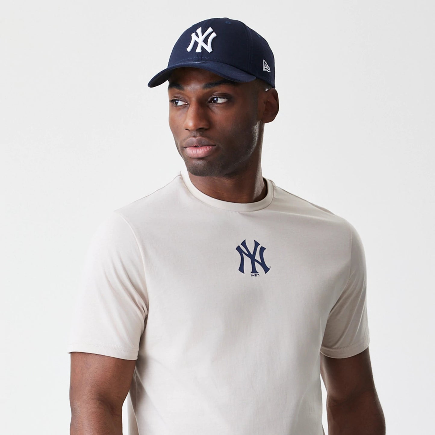 The Male model is wearing New York Yankees MLB Logo Cream T-Shirt 6