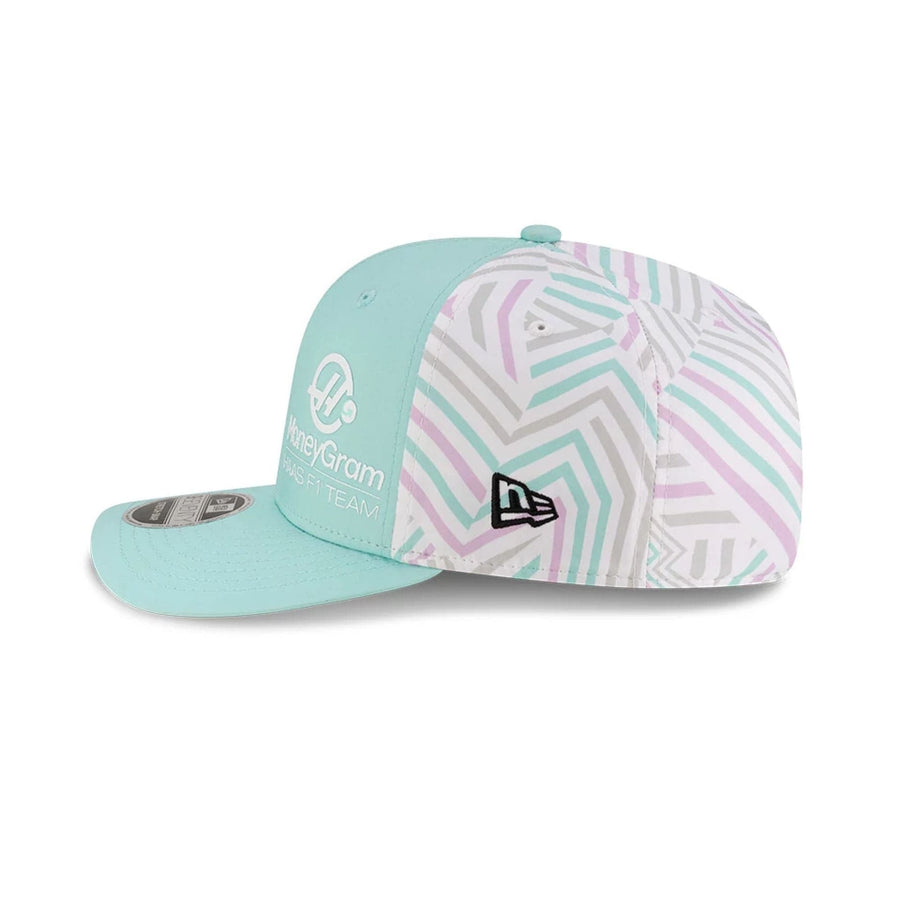 This is a MoneyGram Haas F1 Miami Race Special Turquoise 9SEVENTY Stretch Snap Adjustable Cap 5