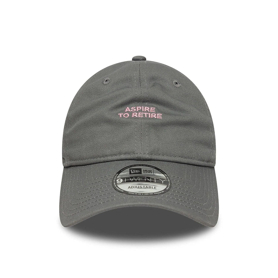 This is a New Era Aspire To Retire Slogan Grey 9TWENTY Adjustable Cap 2