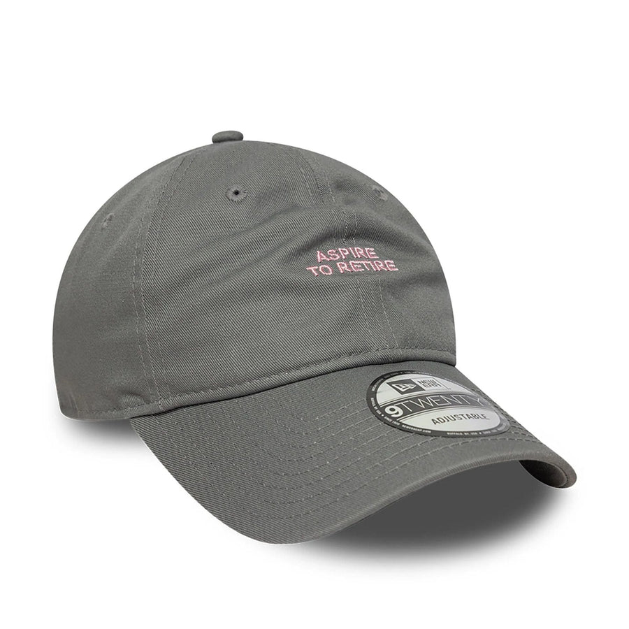This is a New Era Aspire To Retire Slogan Grey 9TWENTY Adjustable Cap 3
