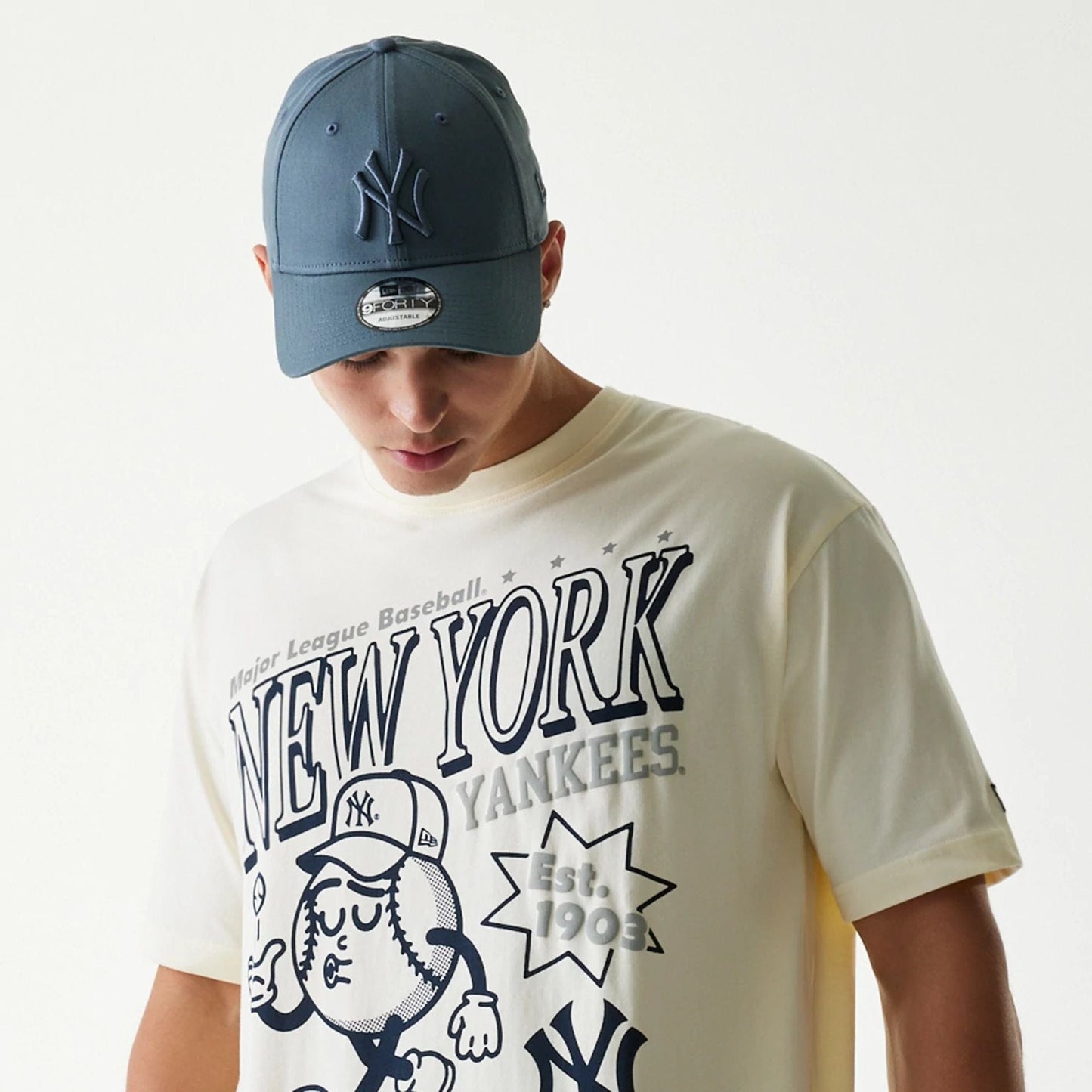 The Male model is wearing New York Yankees MLB Sport Classic Cream T-Shirt 4