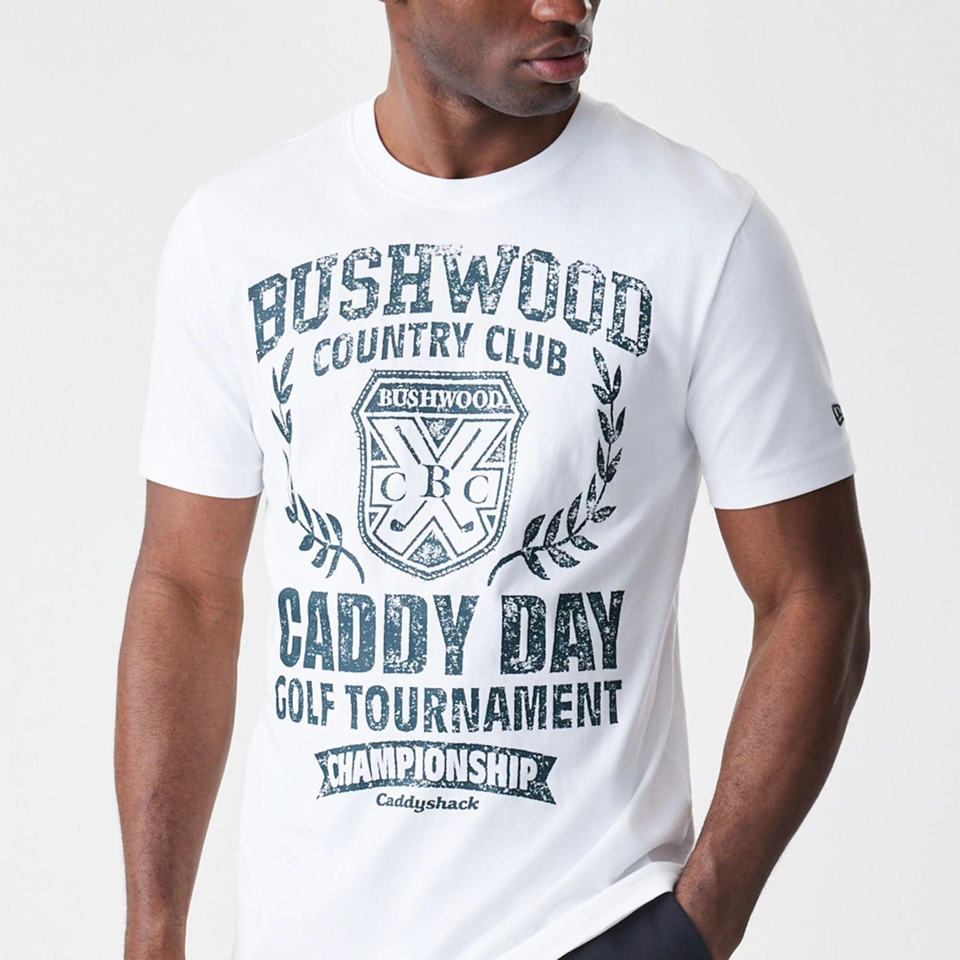 The Male model is wearing Caddyshack Caddy Day Tournament White T-Shirt 3