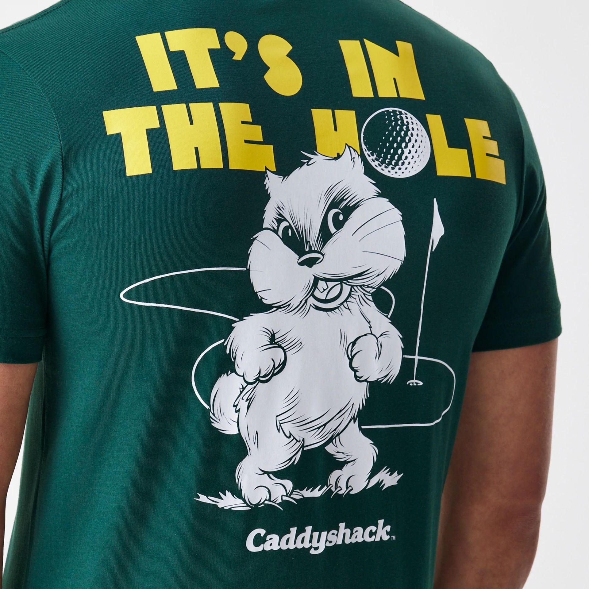 The Male model is wearing Caddyshack It's In The Hole Dark Green T-Shirt 4