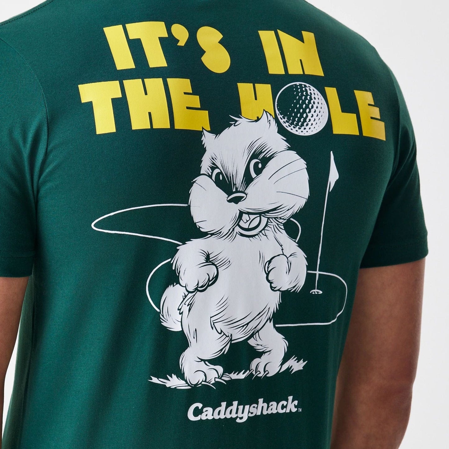The Male model is wearing Caddyshack It's In The Hole Dark Green T-Shirt 4