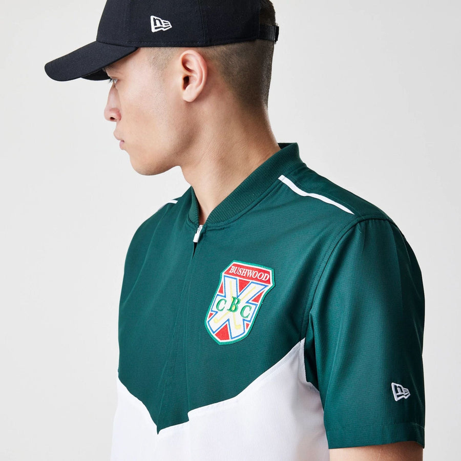 The Male model is wearing Caddyshack BushWood White 1/4 Zip Polo T-Shirt 6