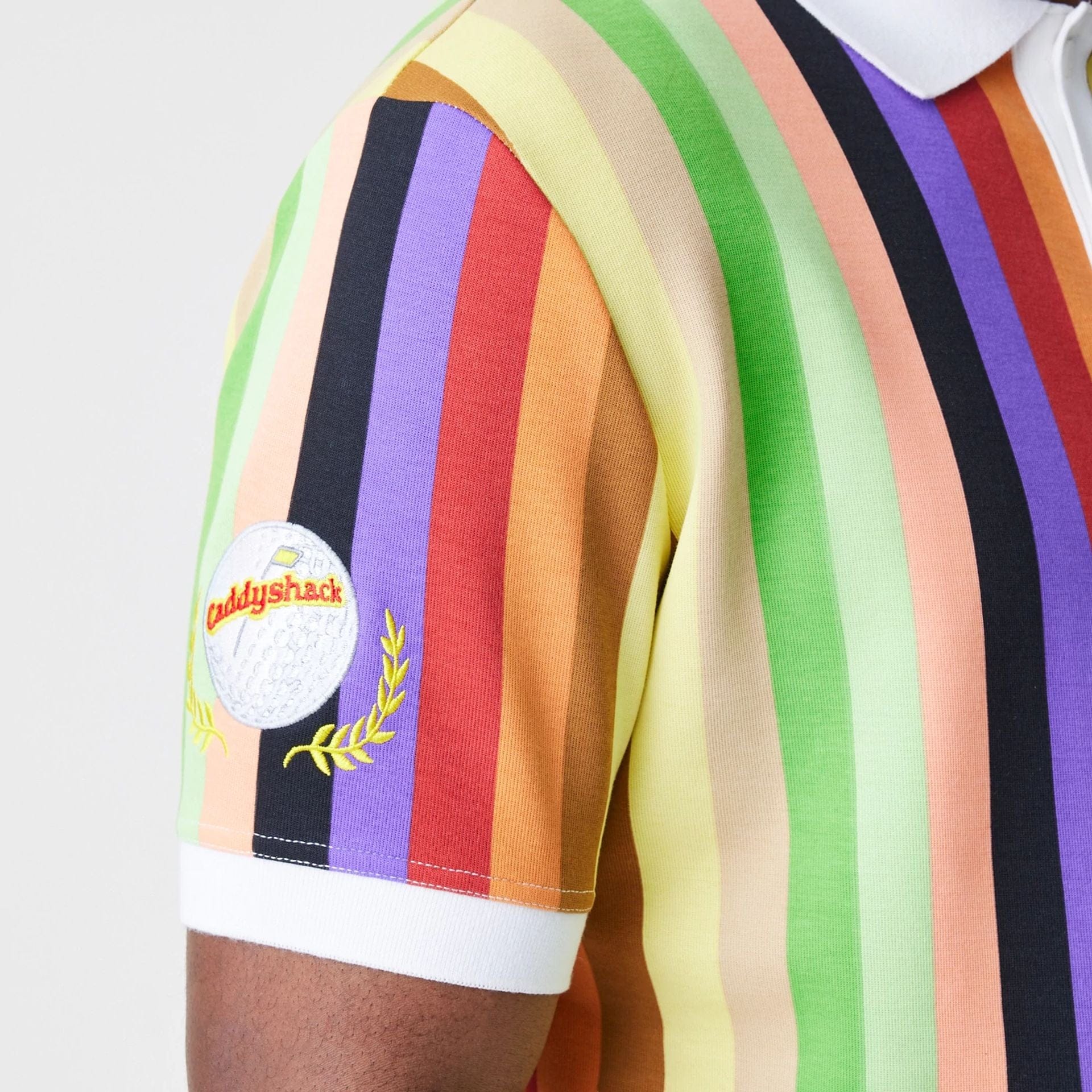 The Male model is wearing Caddyshack BushWood Multi Polo T-Shirt 4