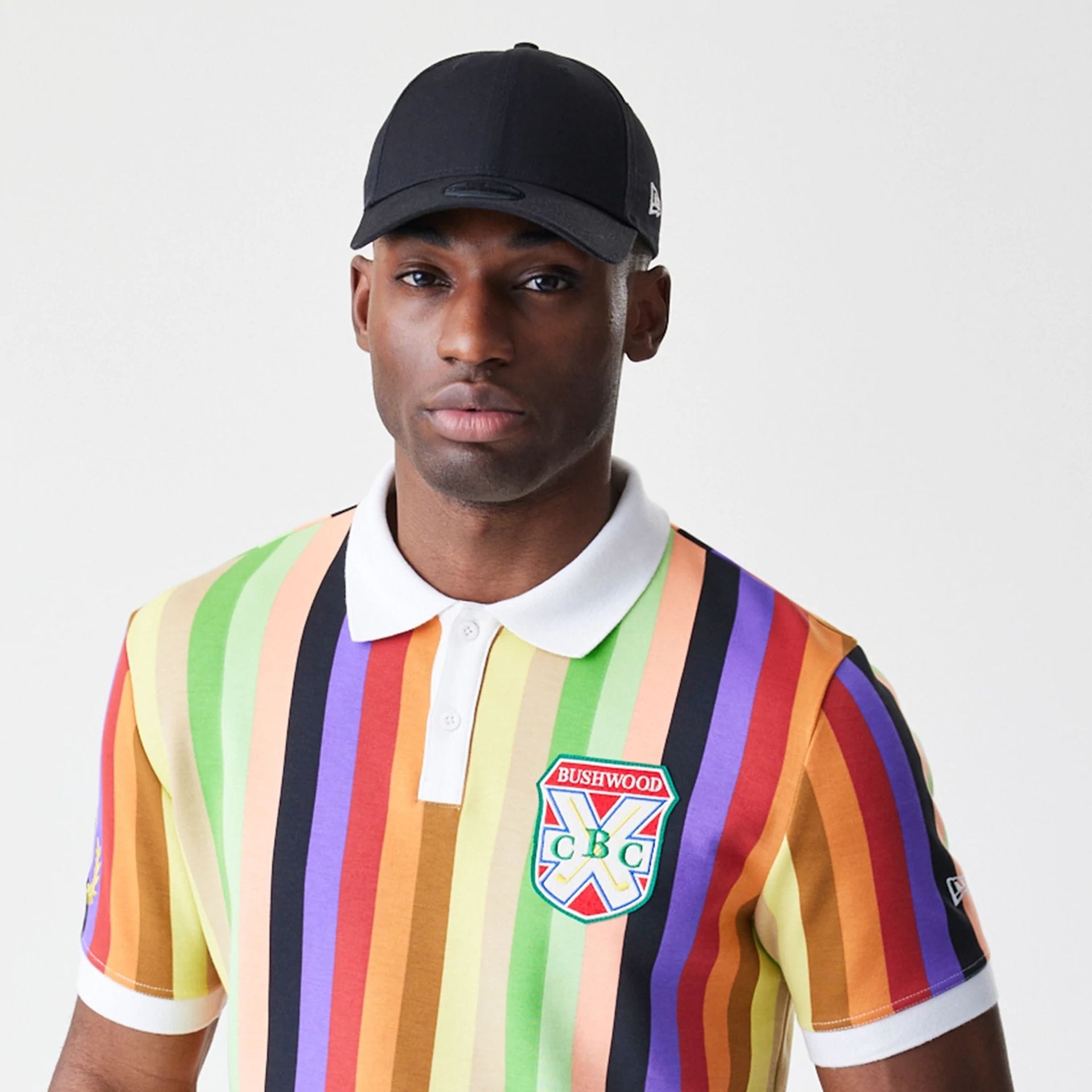 The Male model is wearing Caddyshack BushWood Multi Polo T-Shirt 6