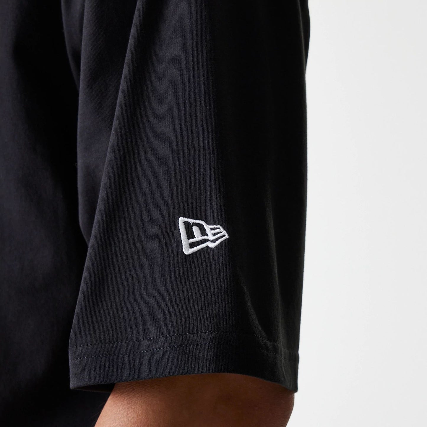 The Male model is wearing New York Yankees MLB League Essential Black Oversized T-Shirt 6